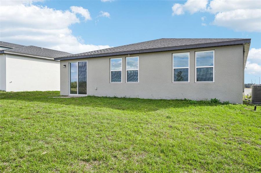Exterior details and patio area of a home in Hamilton Bluff - Signature Series, Lake Hamilton (Image 22).