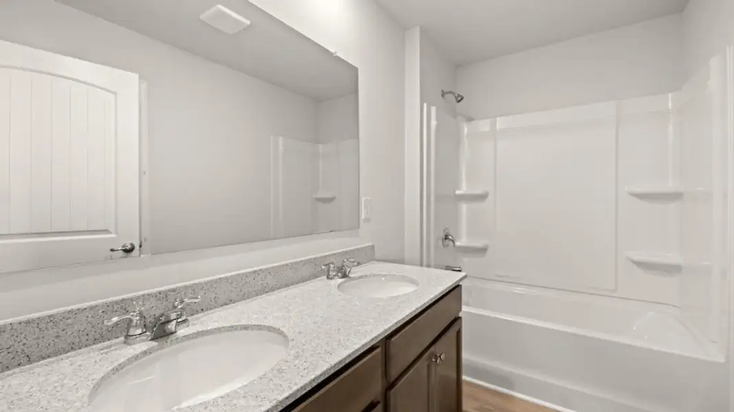 Furnished interior view inside a new home in Fairway 17 at Mirror Lake, Villa Rica (Image 6).