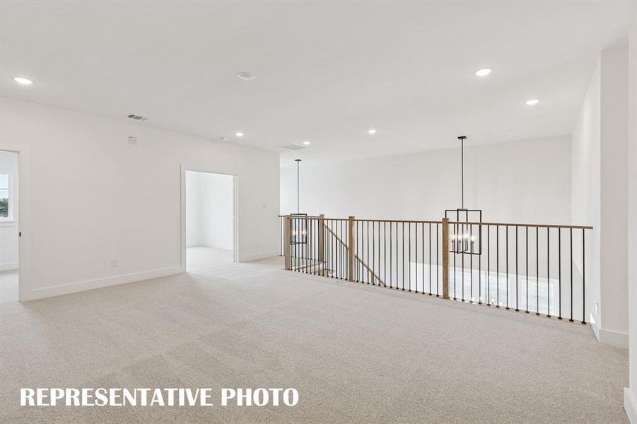 You'll enjoy never ending family fun time in this spacious, light filled game room.  REPRESENTATIVE PHOTO