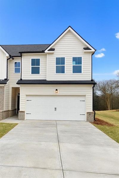 Front exterior of a new home in , Commerce, GA, highlighting curb appeal (Image 1). Front exterior of a new home in , Commerce, GA, highlighting curb appeal (Image 1).