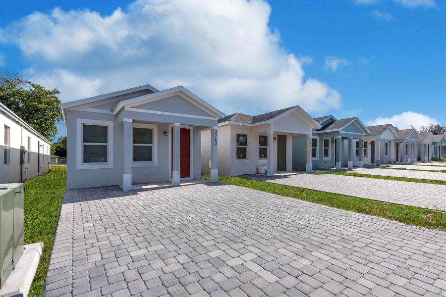 Front exterior of a new home in , West Palm Beach, FL, highlighting curb appeal (Image 2).