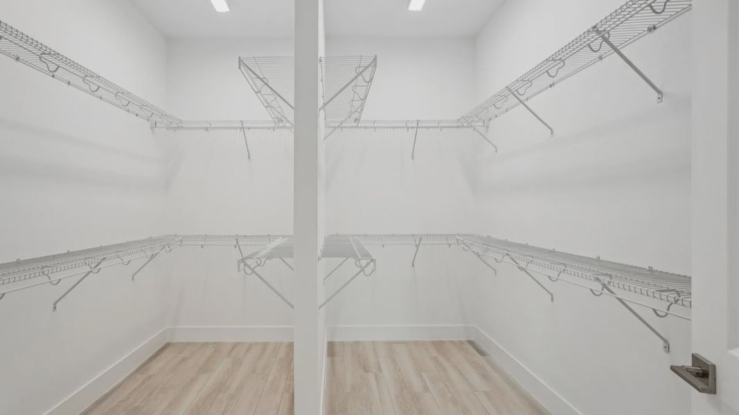 The Primary Walk-In Closet