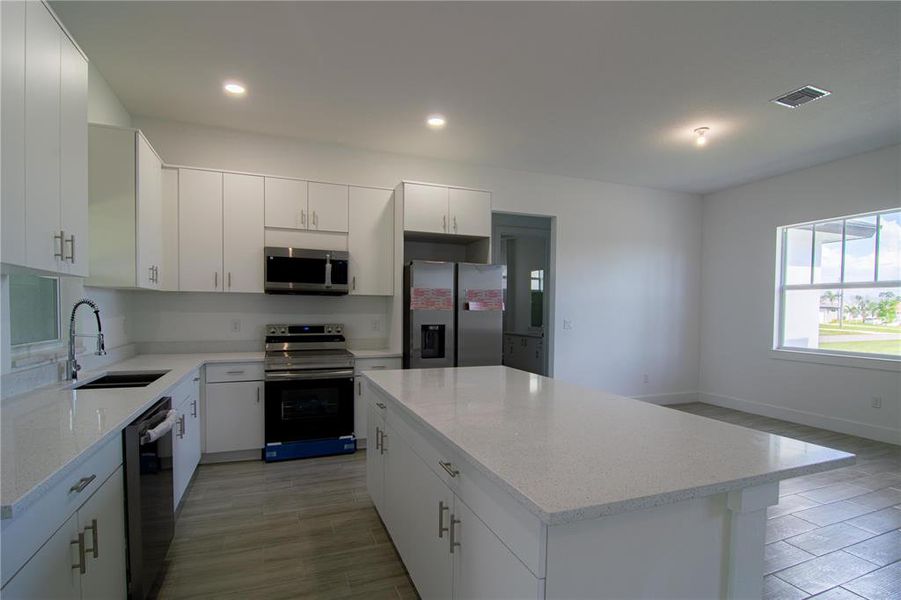 Furnished interior view inside a new home in , Port Charlotte (Image 7).