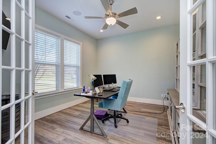 Private Office area off the foyer area with French doors and surround sound