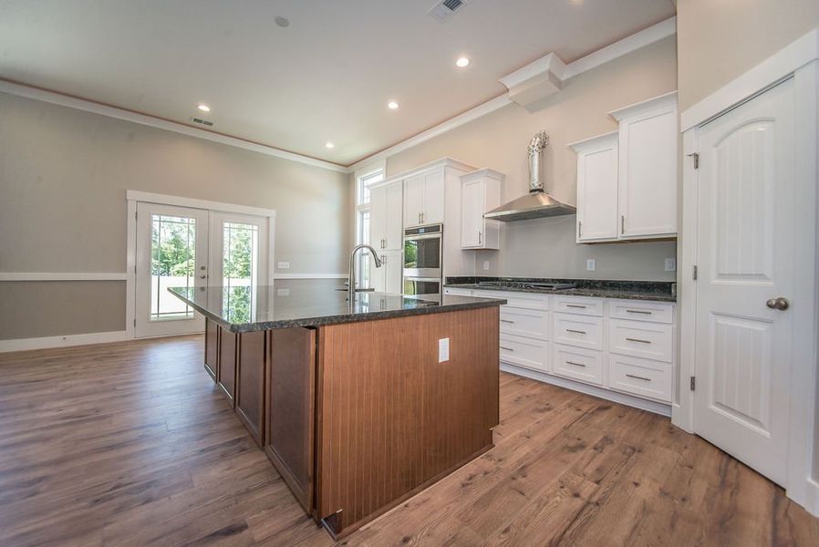 Representative furnished interior of a home built from the Beaumont Elite by Enchanted Homes in Pointe Summit, Slater-Marietta (Image 8).