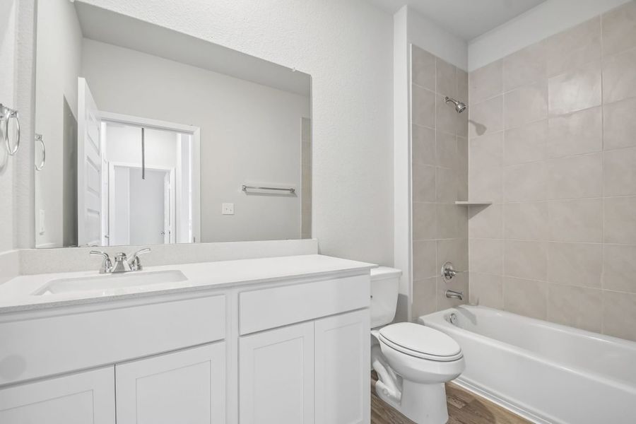 Furnished interior view inside a new home in Edgebrooke, Pflugerville (Image 11).