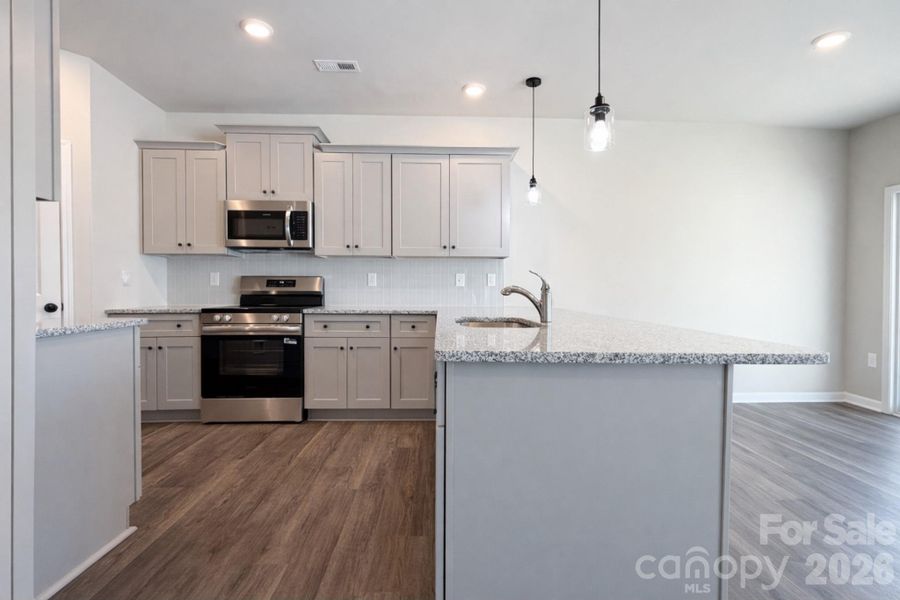 Furnished interior view inside a new home in , Charlotte (Image 5).