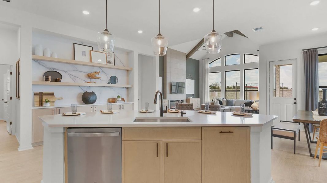 Representative furnished interior of a home built from the Mariah by Chesmar Homes in University Heights, Round Rock (Image 15).
