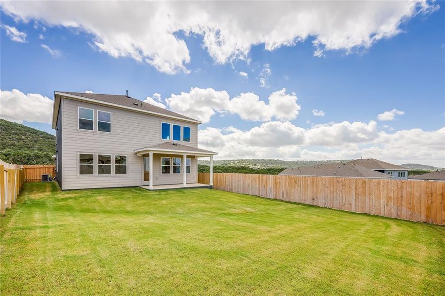 This yard is made for playing! Wether it be a garden, sandbox, swingset, or putting green! It is large enough to do what you want! -even a pool!