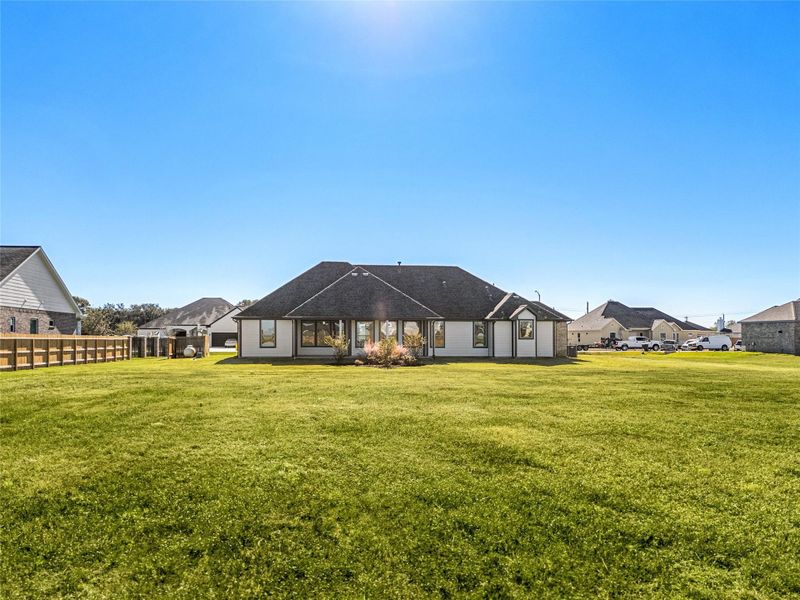 Step outside to a private, fully fenced backyard featuring a covered patio, ideal for enjoying morning coffee, relaxing evenings, or hosting casual gatherings with family and friends. This outdoor space offers both comfort and privacy, creating the perfect retreat to unwind or entertain in a serene setting. Step outside to a private, fully fenced backyard featuring a covered patio, ideal for enjoying morning coffee, relaxing evenings, or hosting casual gatherings with family and friends. This outdoor space offers both comfort and privacy, creating the perfect retreat to unwind or entertain in a serene setting.