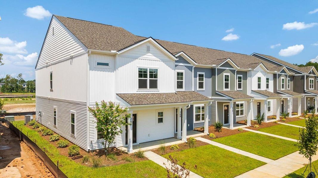 Front exterior of a new home in The Crossing at St. James, Summerville, SC, highlighting curb appeal (Image 2).