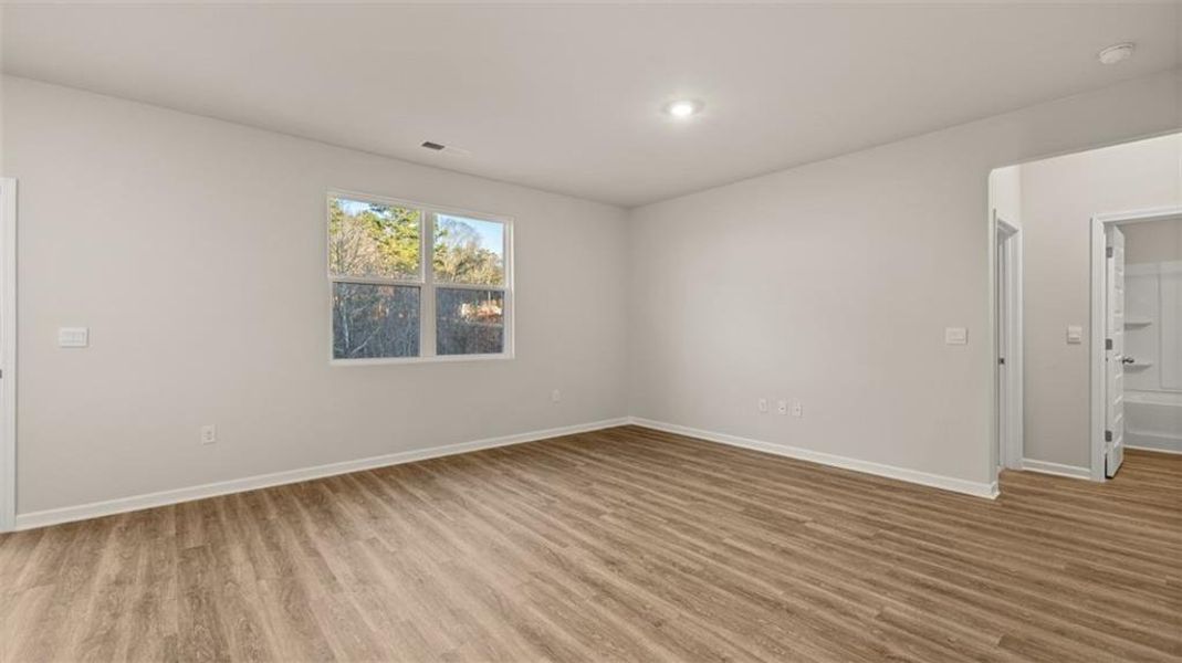 Spacious, unfurnished interior of a new home in Brooks Station, Dacula (Image 14).