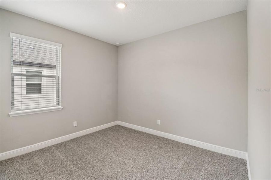 Spacious, unfurnished interior of a new home in Legends Preserve - Signature Series, Daytona Beach (Image 28).