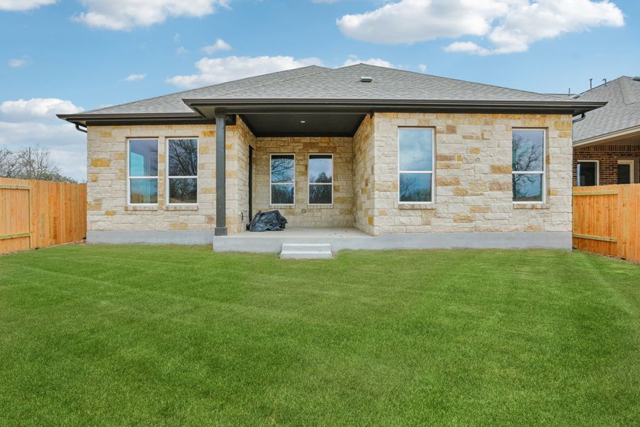Exterior details and patio area of a home in Persimmon, Buda (Image 3).