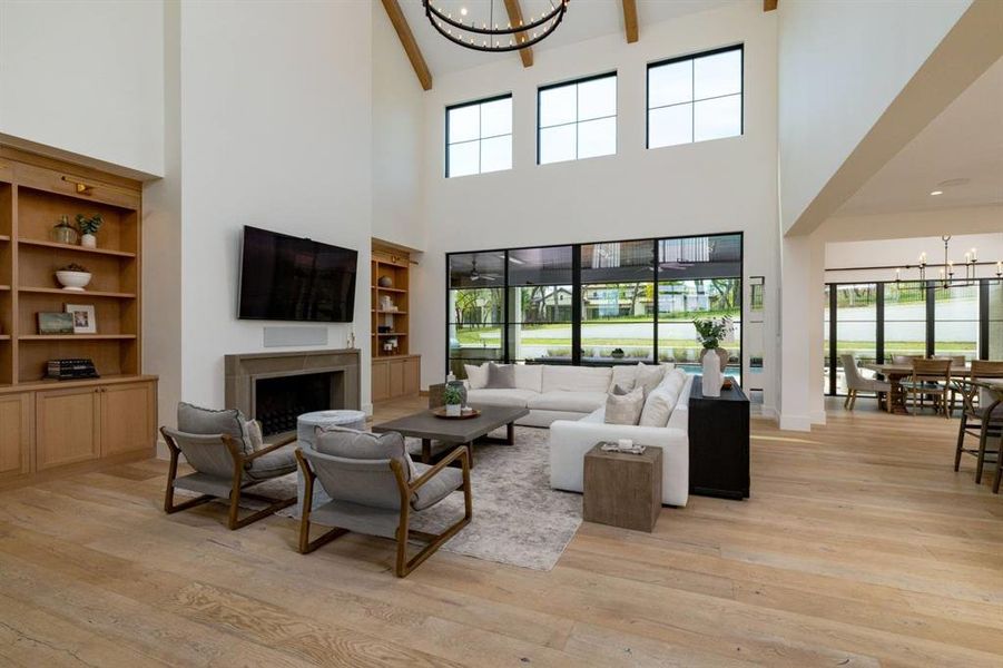 Walking into this wonderful living space with views of the pool instantly relaxes you!