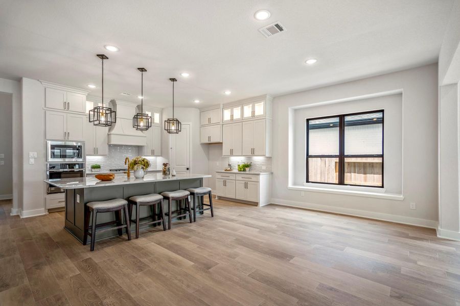 Furnished interior view inside a new home in ARTAVIA, Conroe (Image 18).