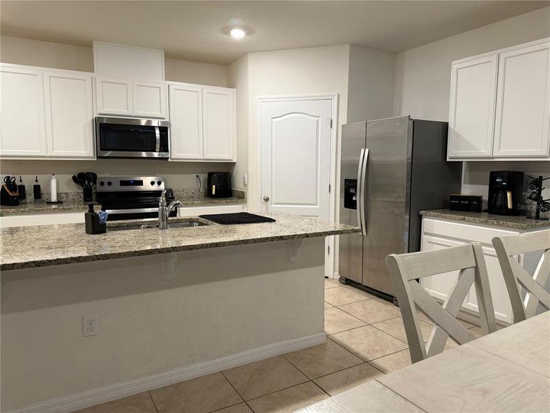 Furnished interior view inside a new home in Cypress Park Estates, Haines City (Image 4).