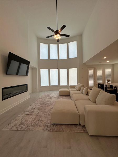 Spacious Living room flooded with natural light . Spacious Living room flooded with natural light .
