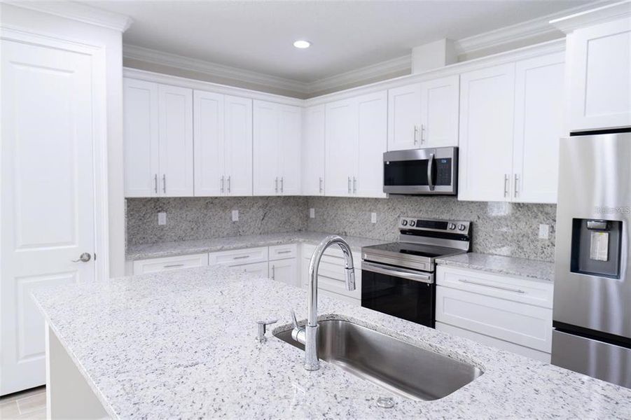 Furnished interior view inside a new home in , Summerfield (Image 10).