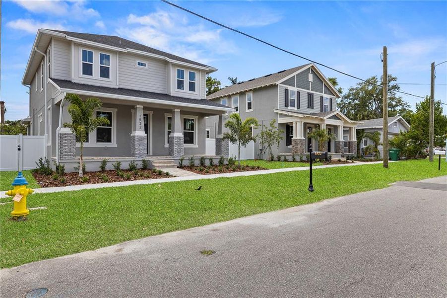Front exterior of a new home in , Tampa, FL, highlighting curb appeal (Image 15). Front exterior of a new home in , Tampa, FL, highlighting curb appeal (Image 15).