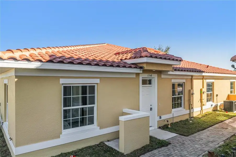 Exterior details and patio area of a home in , Poinciana (Image 3). Exterior details and patio area of a home in , Poinciana (Image 3).