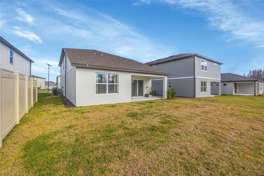 Exterior details and patio area of a home in , Zephyrhills (Image 27).