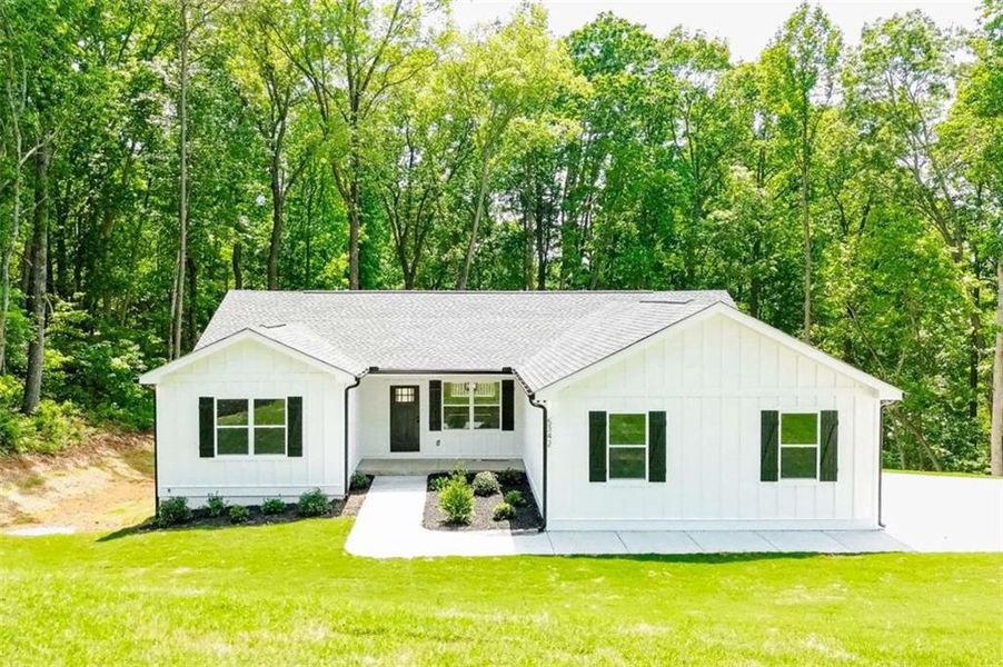 Front exterior of a new home in , Gainesville, GA, highlighting curb appeal (Image 15).