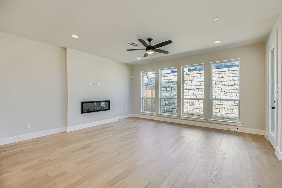 Spacious, unfurnished interior of a new home in Castle Hills Northpointe - Townhomes, Lewisville (Image 16).