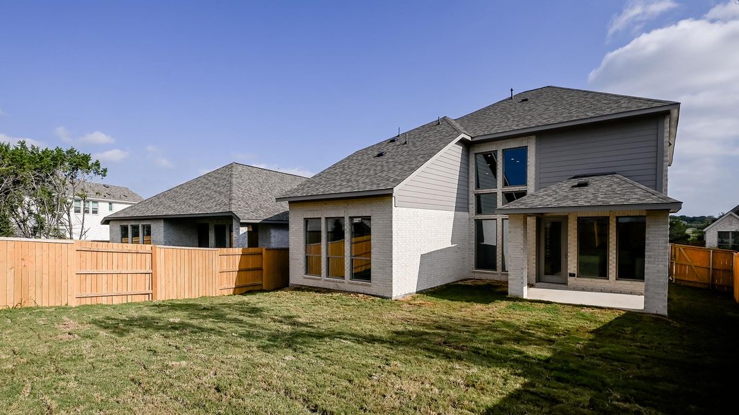Exterior details and patio area of a home in 6 Creeks, Kyle (Image 18).
