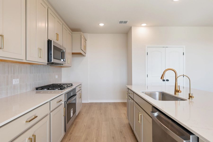 Furnished interior view inside a new home in The Homestead at Lariat, Liberty Hill (Image 10).