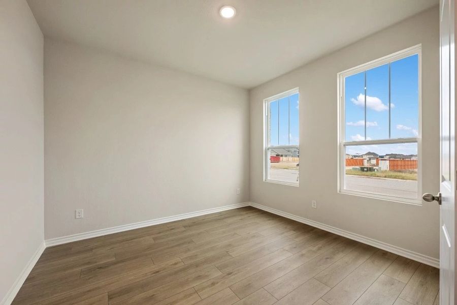 Spacious, unfurnished interior of a new home in The Cottages at Lariat, Liberty Hill (Image 22).
