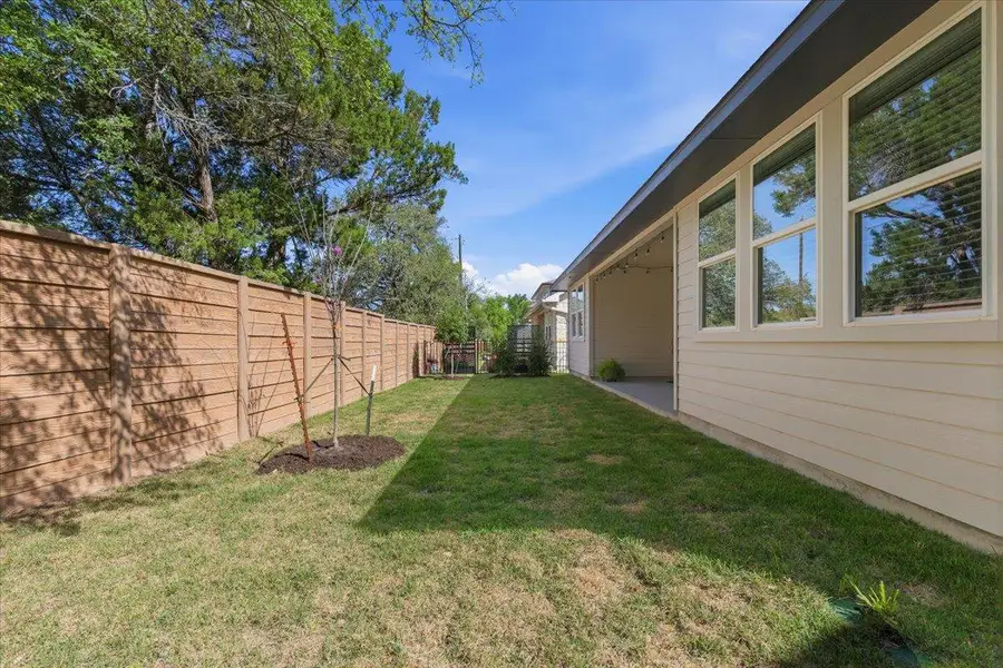 Relax on your patio and enjoy views of the lush greenery beyond your yard.