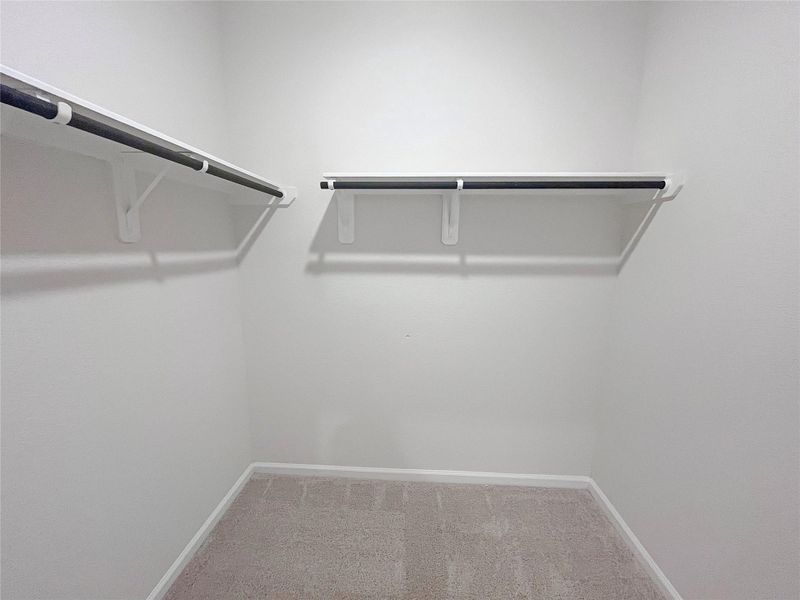 The Robin II- Primary Walk-In Closet. Sample image to be used for example only, colors, options and upgrades vary.