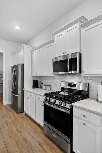 Furnished interior view inside a new home in Sweetgrass at Summers Corner, Summerville (Image 17).