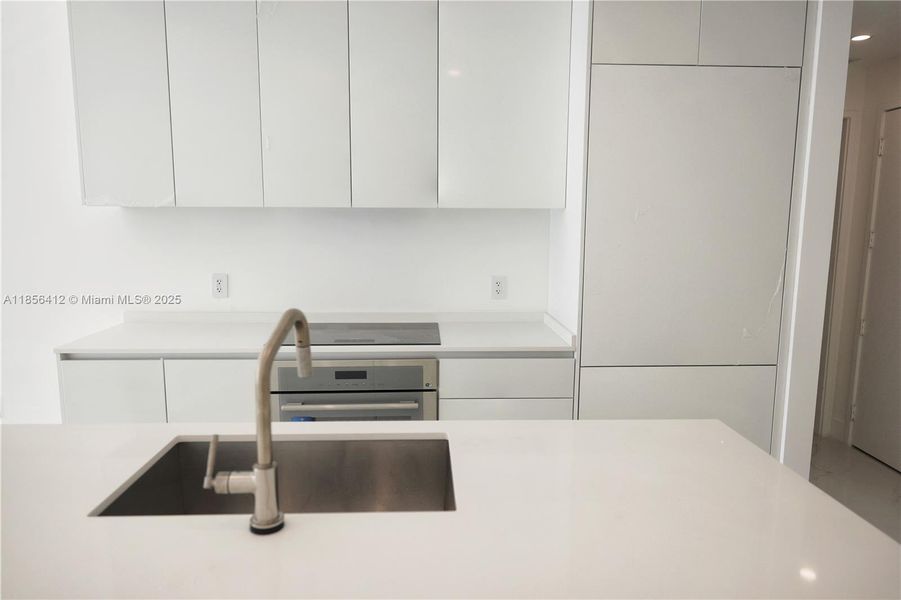 Furnished interior view inside a new home in Aria Reserve, Miami (Image 7).