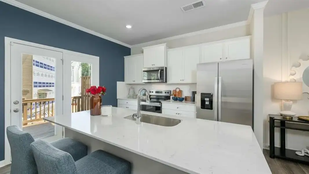 Furnished interior view inside a new home in Townes at Asbury, Hapeville (Image 7). Furnished interior view inside a new home in Townes at Asbury, Hapeville (Image 7).