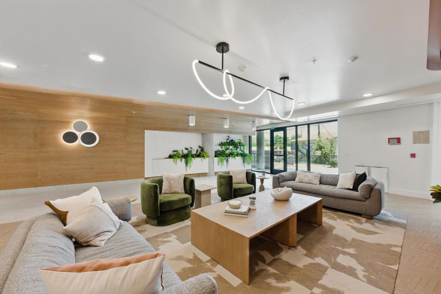 A well-lit common area showcasing clean lines and inviting seating arrangements.