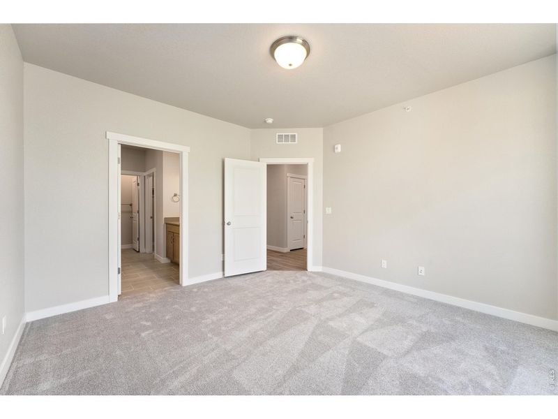 Spacious, unfurnished interior of a new home in The Lakes at Centerra, Loveland (Image 35).