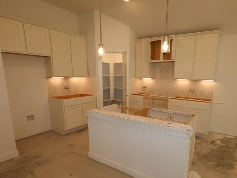 Furnished interior view inside a new home in Pinewood at Grand Texas, New Caney (Image 9).