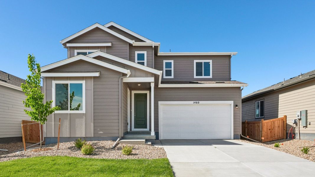 Front exterior of a new home in Trevenna, Windsor, CO, highlighting curb appeal (Image 21).