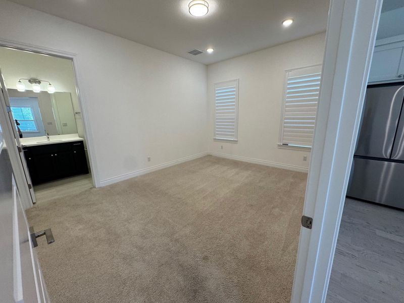 Bedroom 2 -"Mother in law" suite bedroom, carpet, recessed lighting, and ensuite full bath