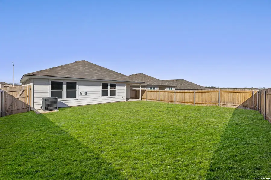 Exterior details and patio area of a home in Arroyo Ranch, Seguin (Image 3).