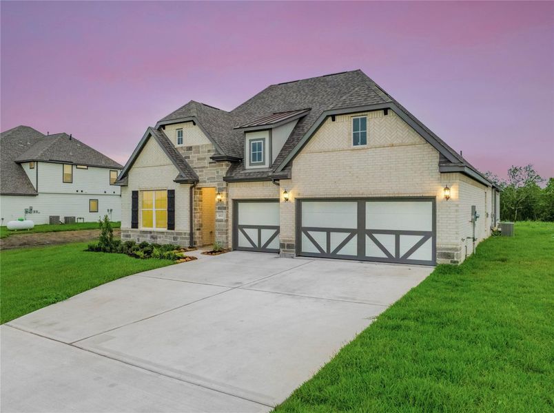 Front exterior of a new home in , Rosharon, TX, highlighting curb appeal (Image 24).