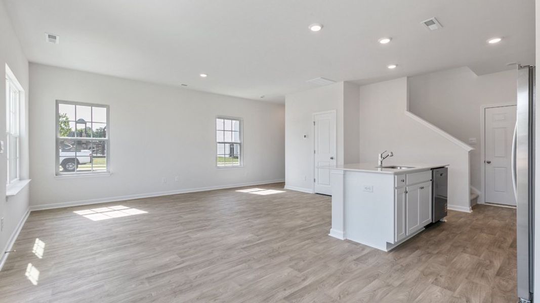 Spacious, unfurnished interior of a new home in The Townes at Matthews Landing, Fuquay Varina (Image 13). Spacious, unfurnished interior of a new home in The Townes at Matthews Landing, Fuquay Varina (Image 13).