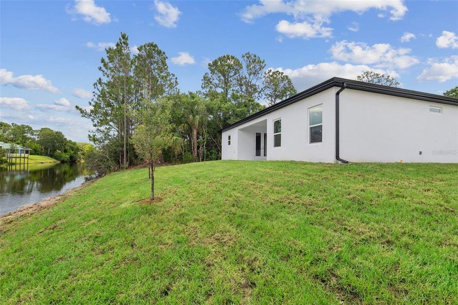 Front exterior of a new home in , Sebastian, FL, highlighting curb appeal (Image 2).