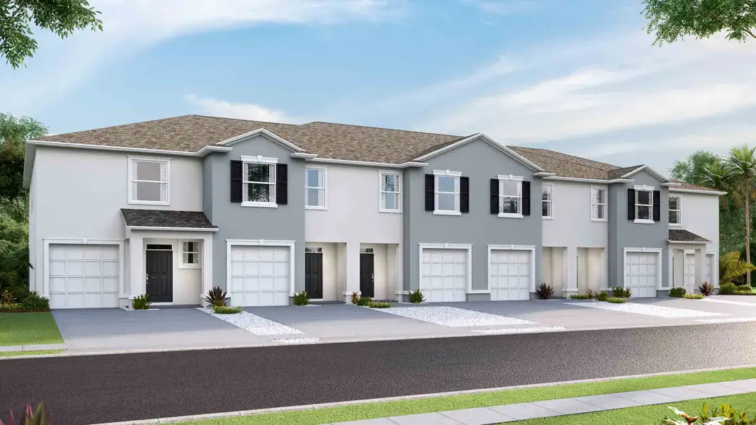Front exterior of a new home in Westwood, Land O' Lakes, FL, highlighting curb appeal (Image 2).