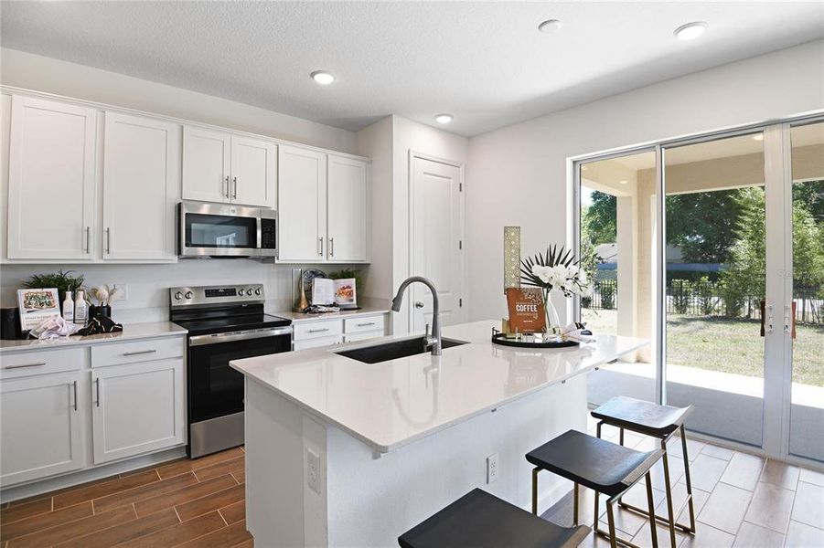 Furnished interior view inside a new home in Seasons at Wekiva Ridge, Mount Dora (Image 6).