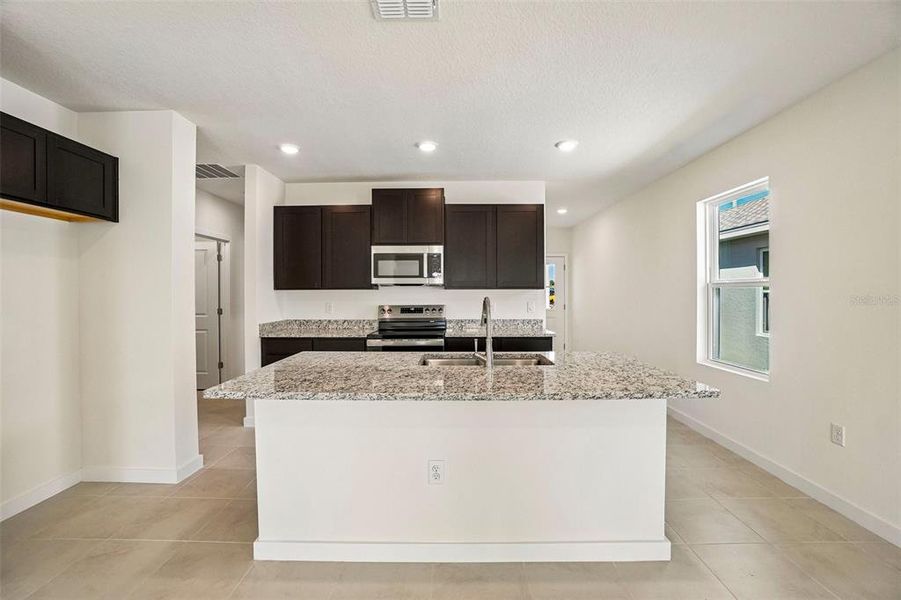 Furnished interior view inside a new home in Willowbrook North, Winter Haven (Image 13). Furnished interior view inside a new home in Willowbrook North, Winter Haven (Image 13).