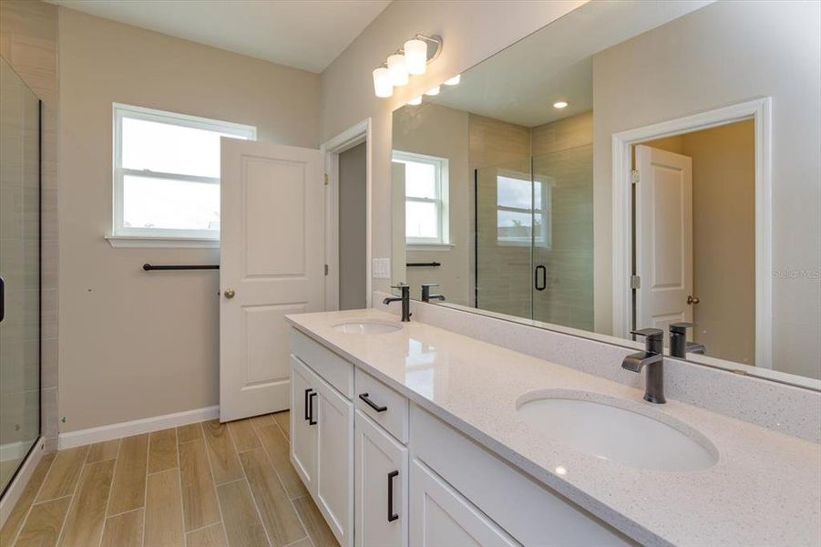 Furnished interior view inside a new home in Serenade at Ovation, Winter Garden (Image 16).