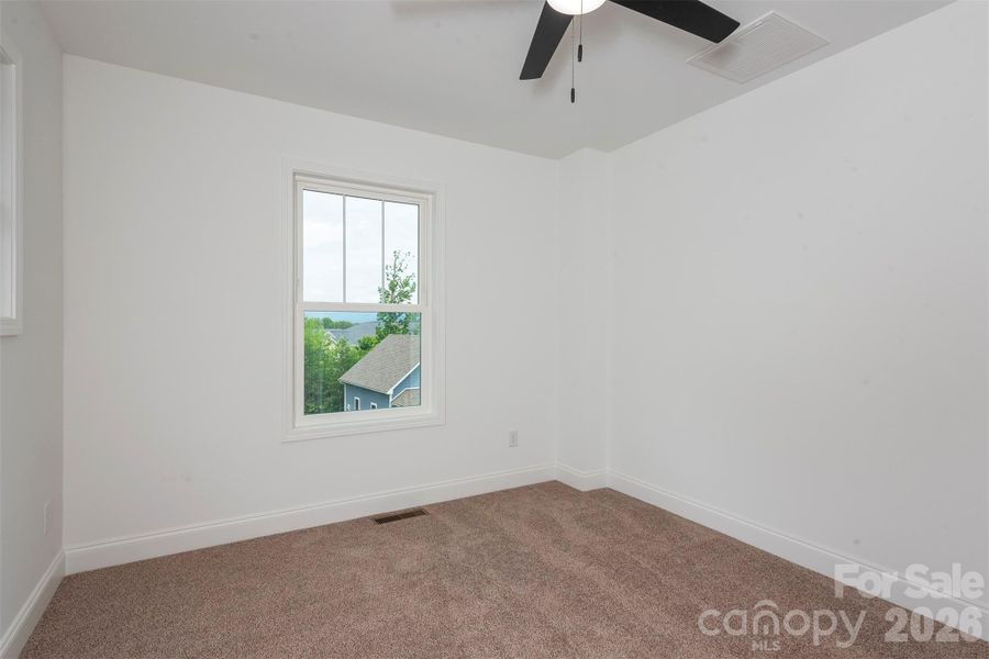 Second bedroom with mountain views